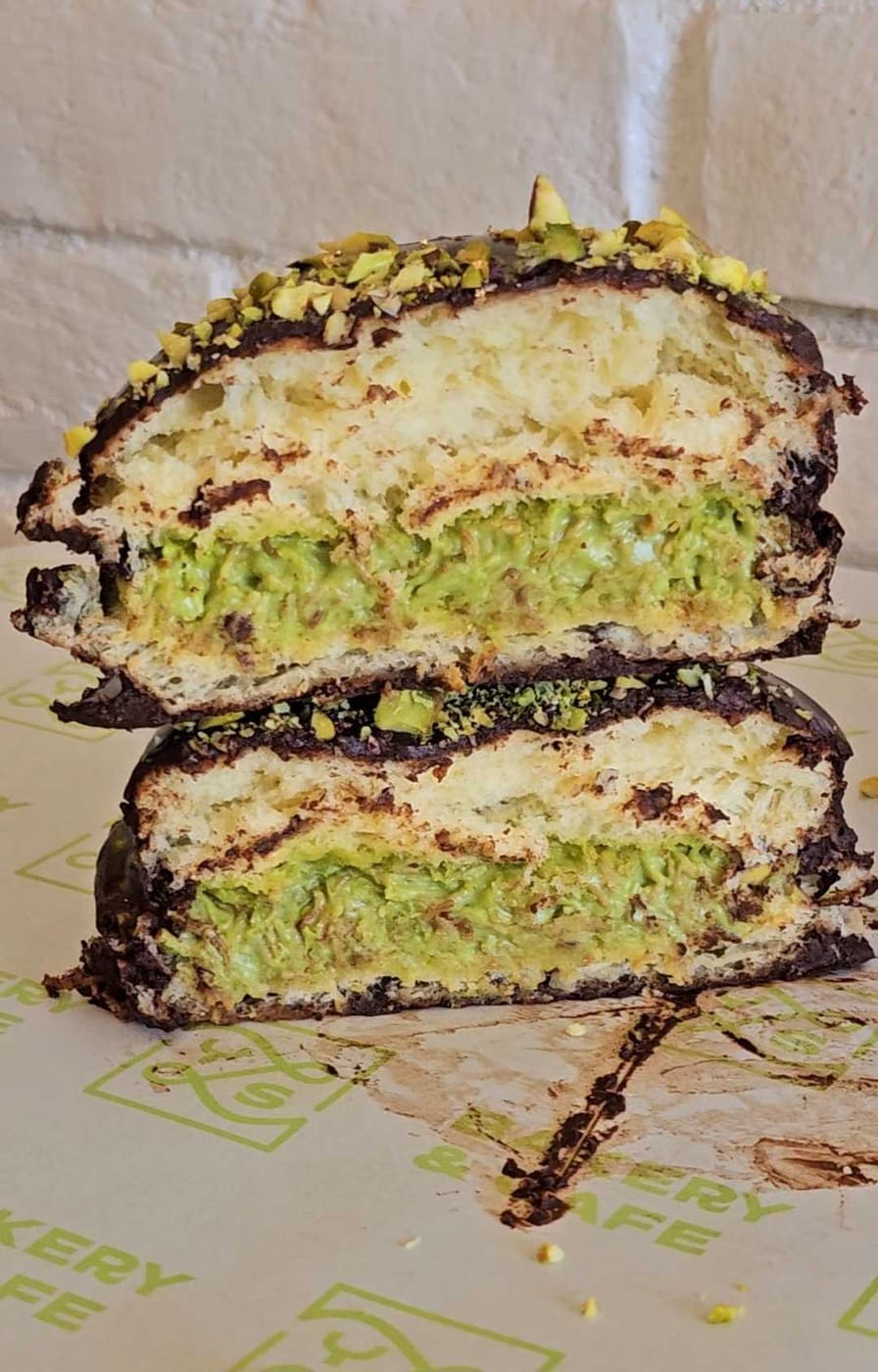 Dubai chocolate pistachio pastry, cut open, at YLS Bakery & Cafe